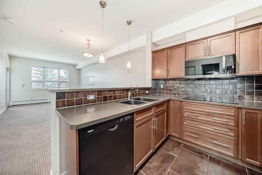 MLS® A2256512 - Unit #206 26 Val Gardena View SW in Springbank Hill Calgary, Residential