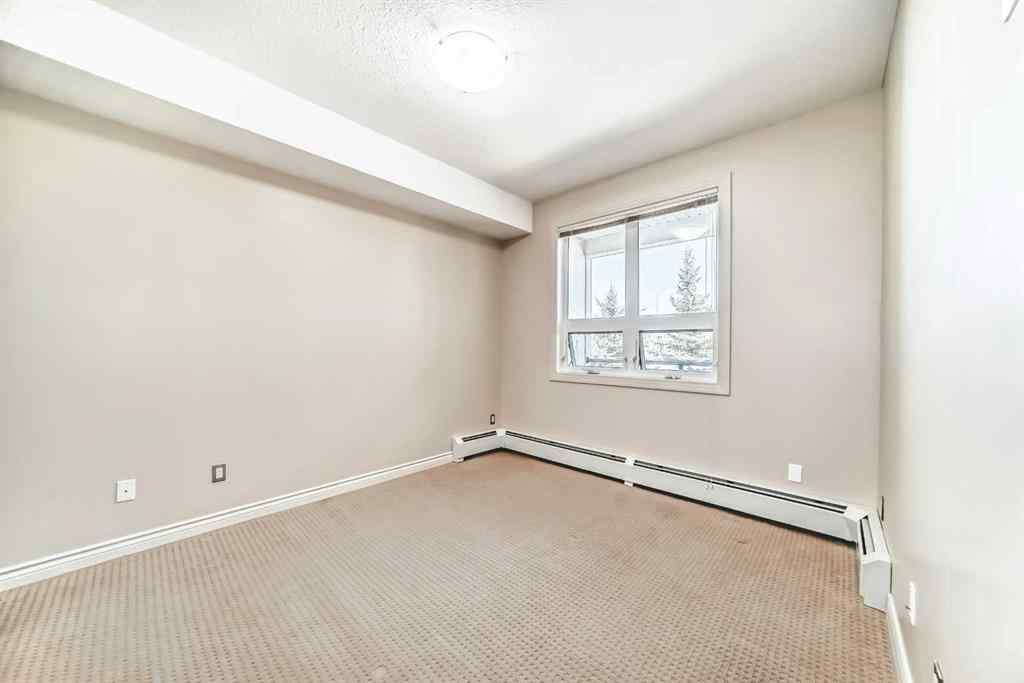 MLS® A2256512 - Unit #206 26 Val Gardena View SW in Springbank Hill Calgary, Residential