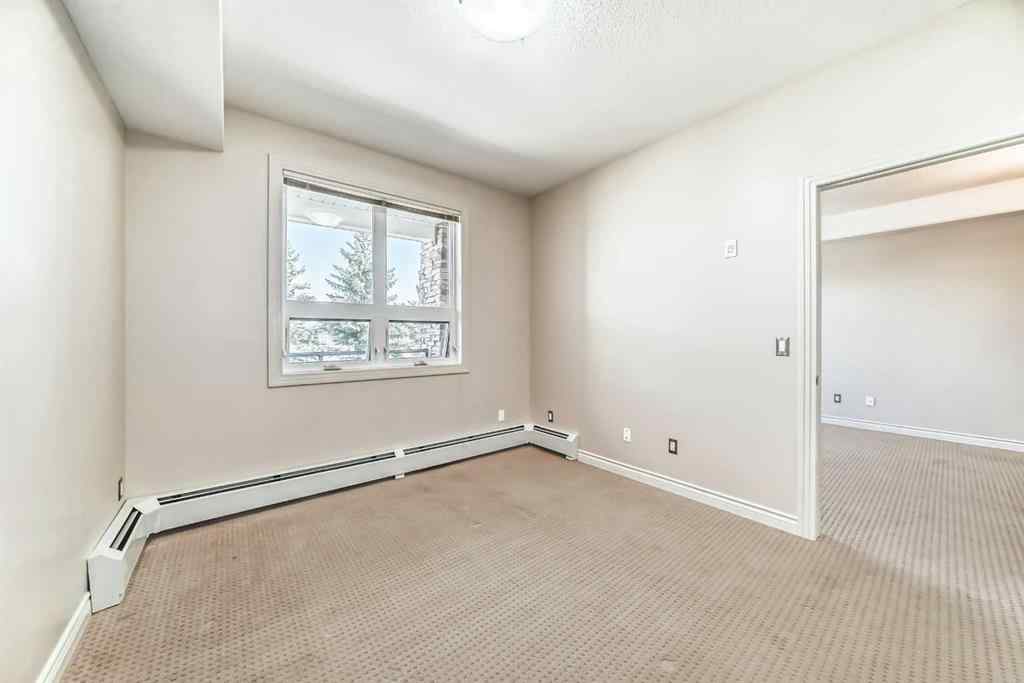 MLS® A2256512 - Unit #206 26 Val Gardena View SW in Springbank Hill Calgary, Residential