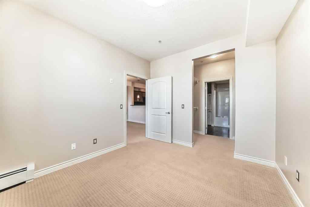 MLS® A2256512 - Unit #206 26 Val Gardena View SW in Springbank Hill Calgary, Residential
