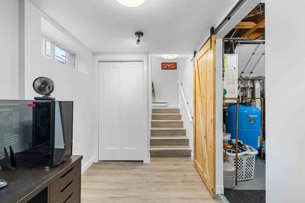 MLS® A2256532 - 56 Harley Road SW in Haysboro Calgary, Residential