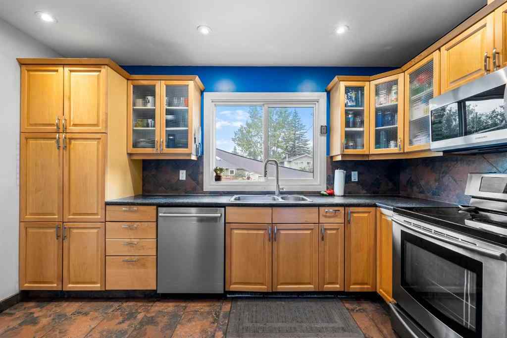MLS® A2256532 - 56 Harley Road SW in Haysboro Calgary, Residential