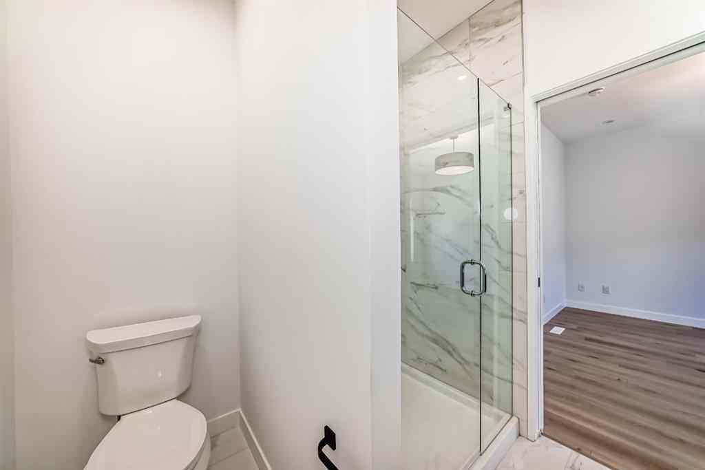 MLS® A2256548 - Unit #512 8155 8 Avenue SW in West Springs Calgary, Residential