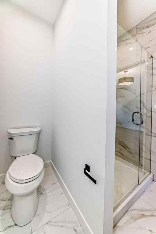 MLS® A2256548 - Unit #512 8155 8 Avenue SW in West Springs Calgary, Residential