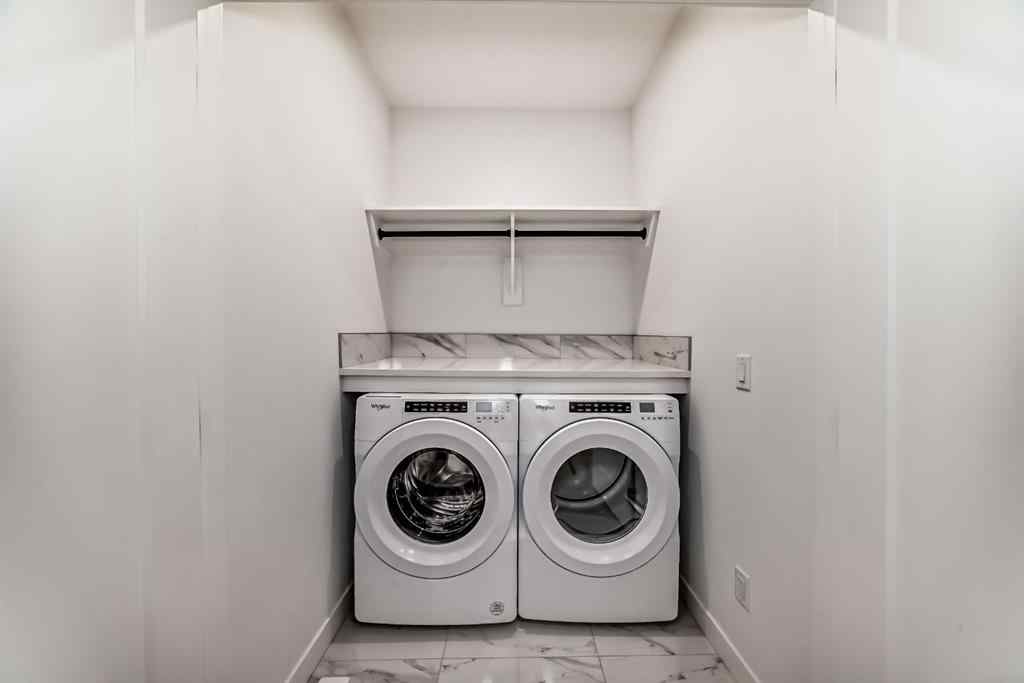 MLS® A2256548 - Unit #512 8155 8 Avenue SW in West Springs Calgary, Residential