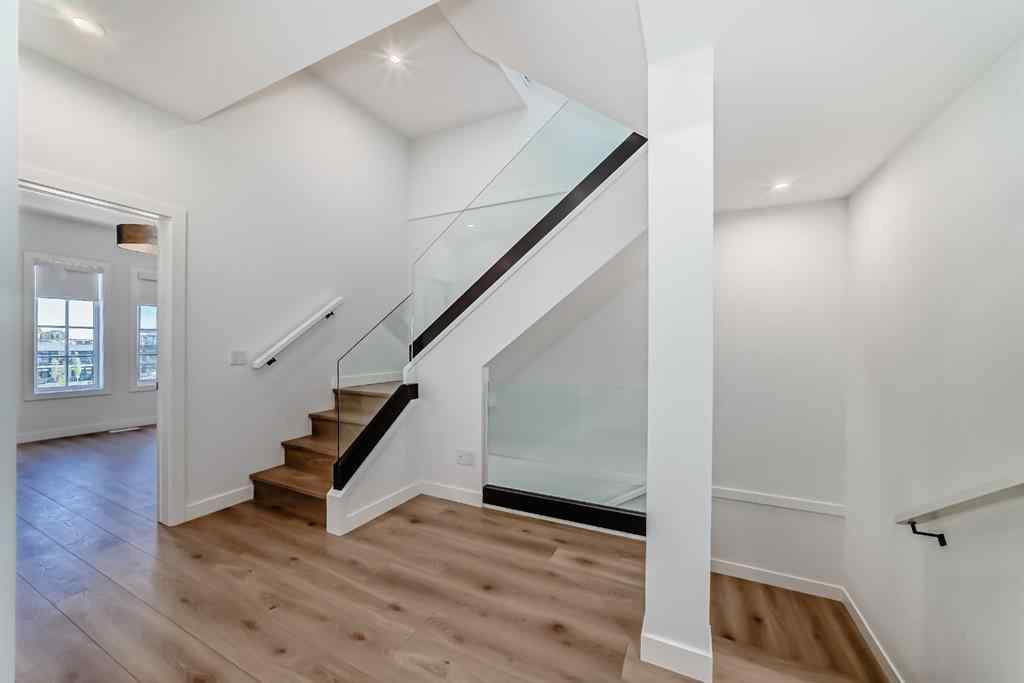 MLS® A2256548 - Unit #512 8155 8 Avenue SW in West Springs Calgary, Residential