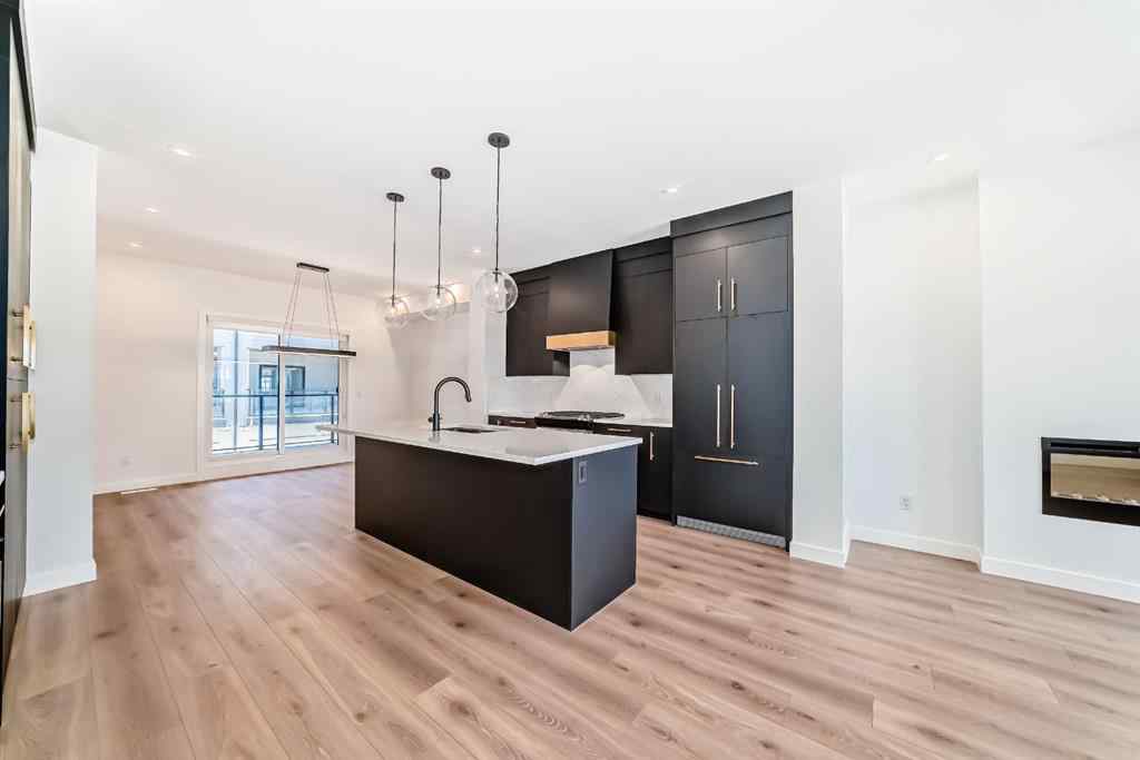 MLS® A2256548 - Unit #512 8155 8 Avenue SW in West Springs Calgary, Residential