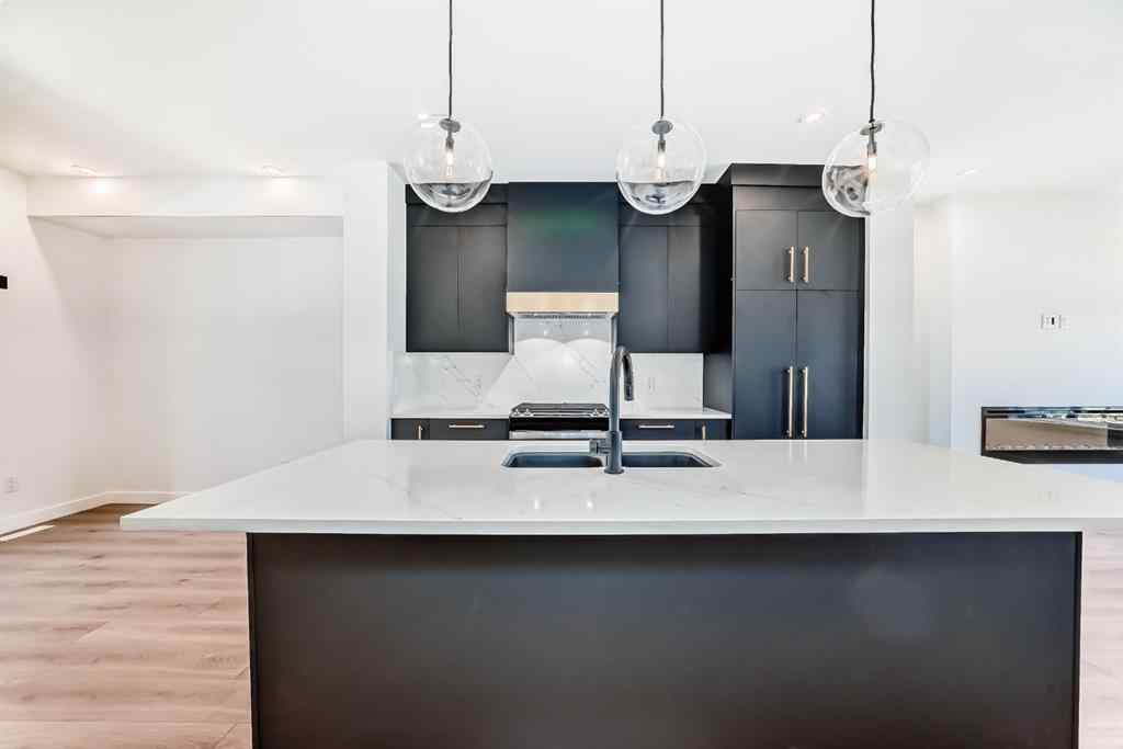 MLS® A2256548 - Unit #512 8155 8 Avenue SW in West Springs Calgary, Residential