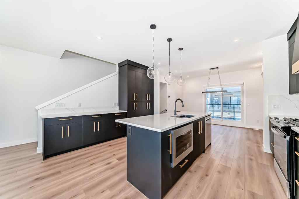 MLS® A2256548 - Unit #512 8155 8 Avenue SW in West Springs Calgary, Residential