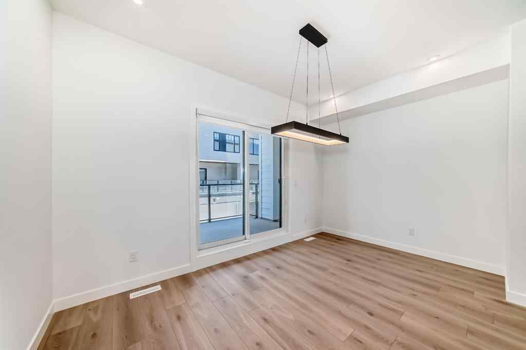 MLS® A2256548 - Unit #512 8155 8 Avenue SW in West Springs Calgary, Residential