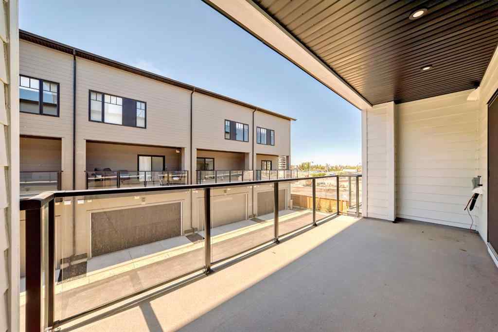 MLS® A2256548 - Unit #512 8155 8 Avenue SW in West Springs Calgary, Residential