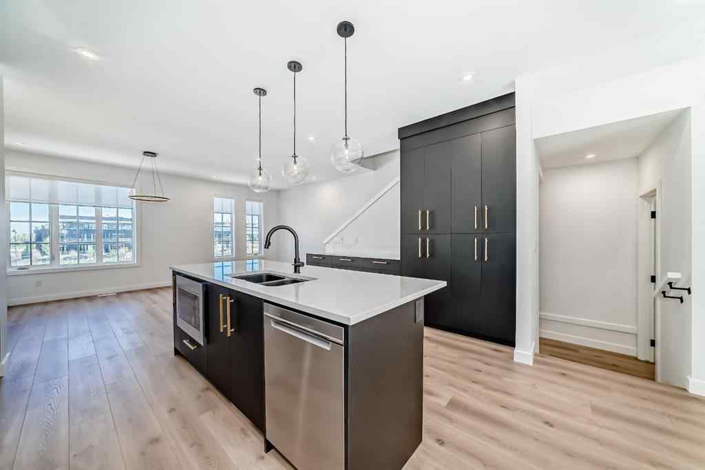 MLS® A2256548 - Unit #512 8155 8 Avenue SW in West Springs Calgary, Residential