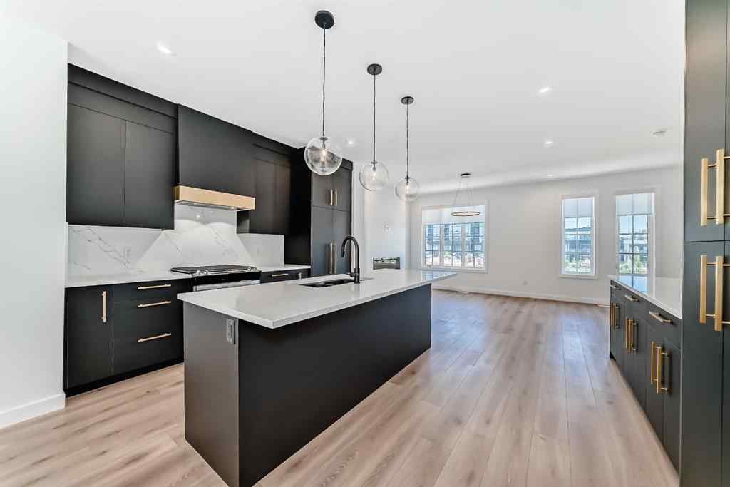 MLS® A2256548 - Unit #512 8155 8 Avenue SW in West Springs Calgary, Residential