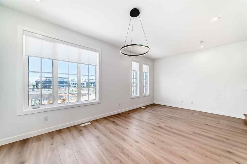 MLS® A2256548 - Unit #512 8155 8 Avenue SW in West Springs Calgary, Residential