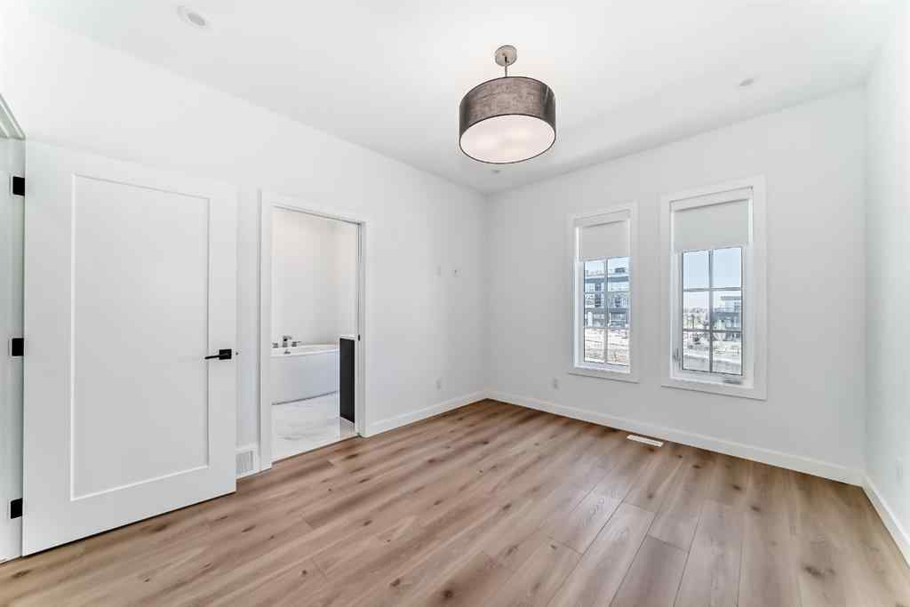 MLS® A2256548 - Unit #512 8155 8 Avenue SW in West Springs Calgary, Residential