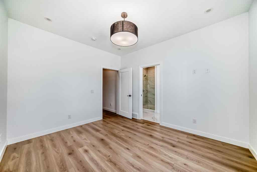 MLS® A2256548 - Unit #512 8155 8 Avenue SW in West Springs Calgary, Residential