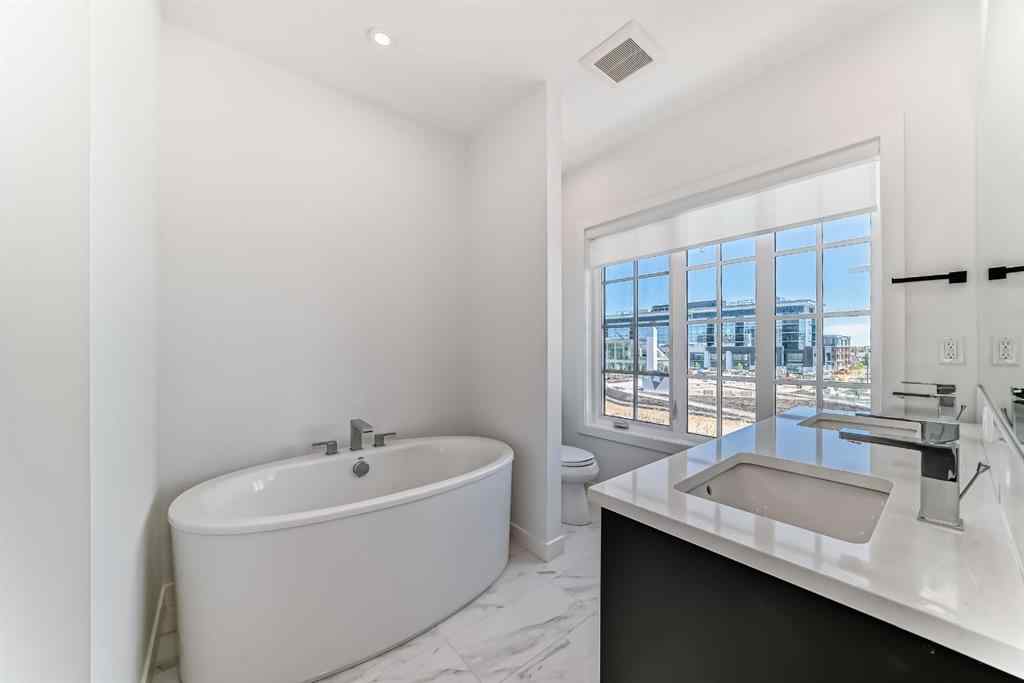 MLS® A2256548 - Unit #512 8155 8 Avenue SW in West Springs Calgary, Residential