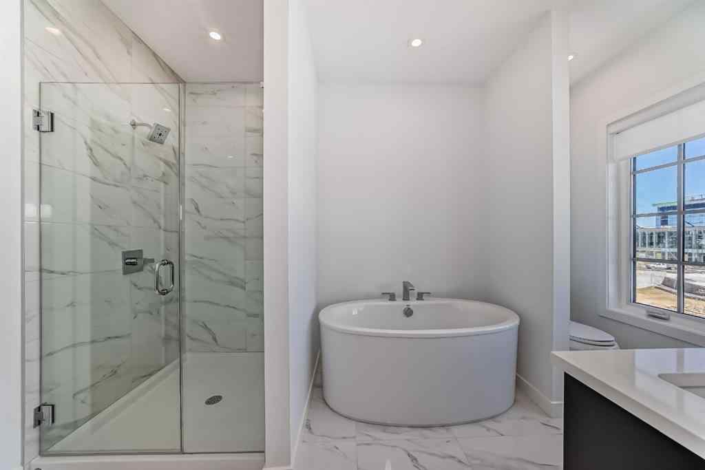 MLS® A2256548 - Unit #512 8155 8 Avenue SW in West Springs Calgary, Residential