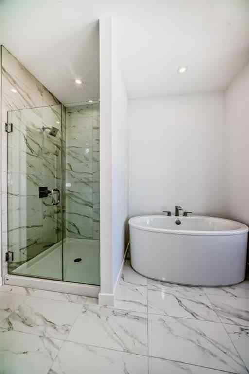 MLS® A2256548 - Unit #512 8155 8 Avenue SW in West Springs Calgary, Residential