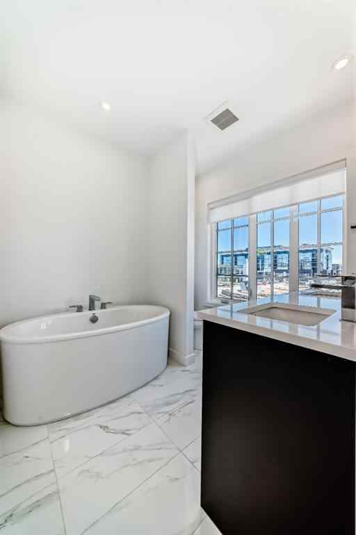 MLS® A2256548 - Unit #512 8155 8 Avenue SW in West Springs Calgary, Residential