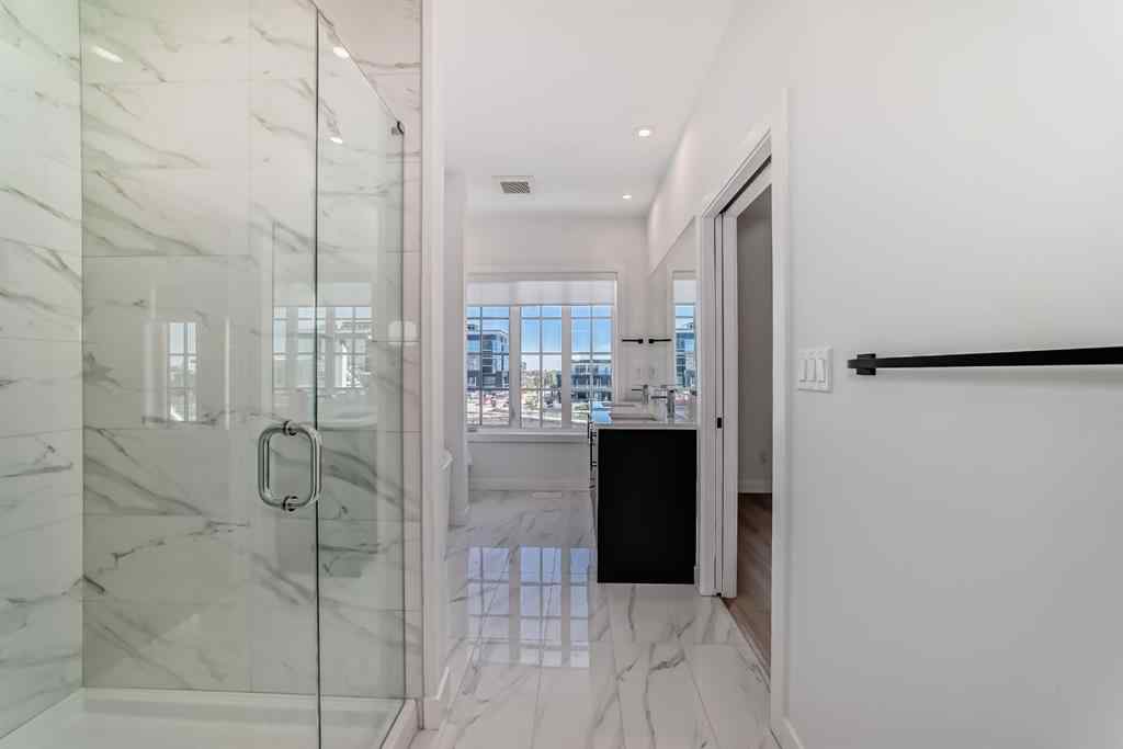 MLS® A2256548 - Unit #512 8155 8 Avenue SW in West Springs Calgary, Residential