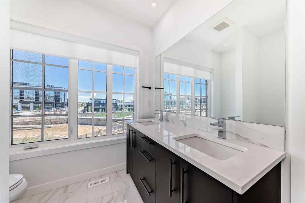 MLS® A2256548 - Unit #512 8155 8 Avenue SW in West Springs Calgary, Residential