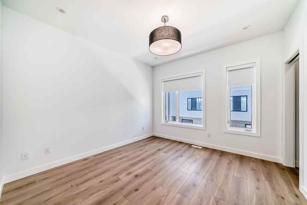 MLS® A2256548 - Unit #512 8155 8 Avenue SW in West Springs Calgary, Residential