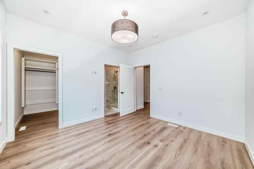 MLS® A2256548 - Unit #512 8155 8 Avenue SW in West Springs Calgary, Residential