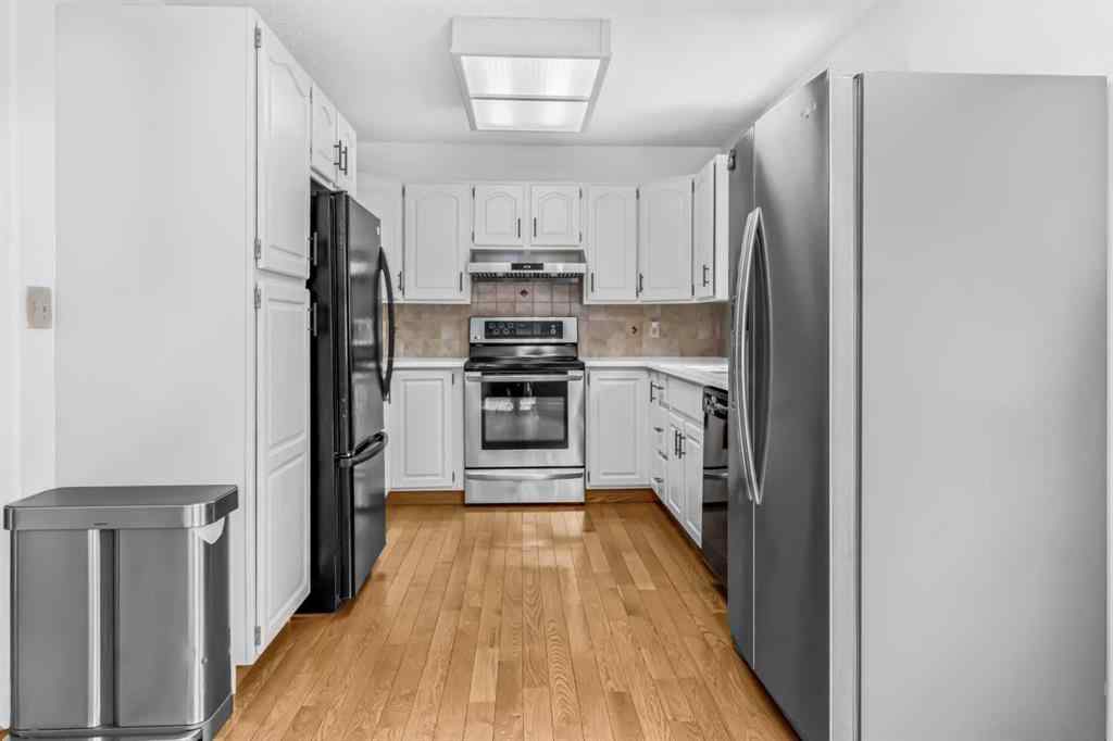 MLS® A2256574 - 46 Sun Harbour Road SE in Sundance Calgary, Residential