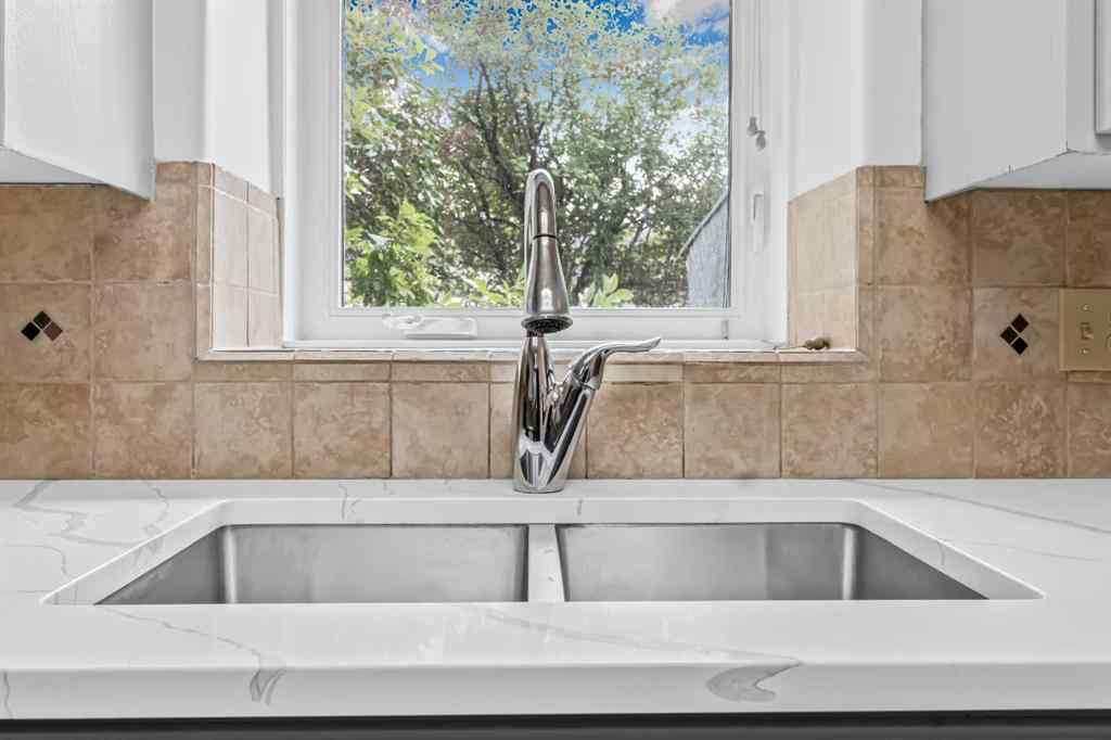 MLS® A2256574 - 46 Sun Harbour Road SE in Sundance Calgary, Residential