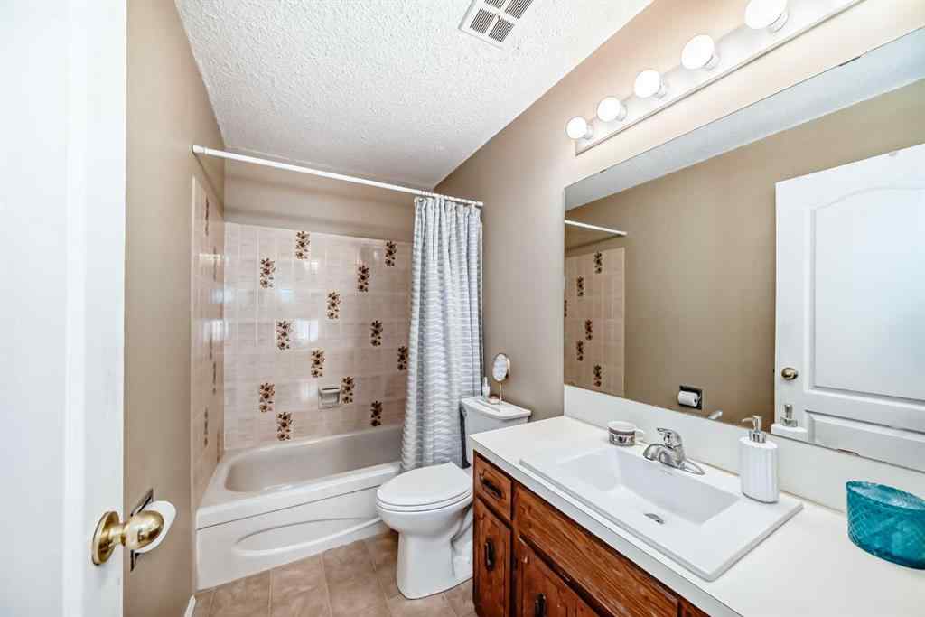 MLS® A2256580 - 244 Flett Drive NE in Jensen Airdrie, Residential