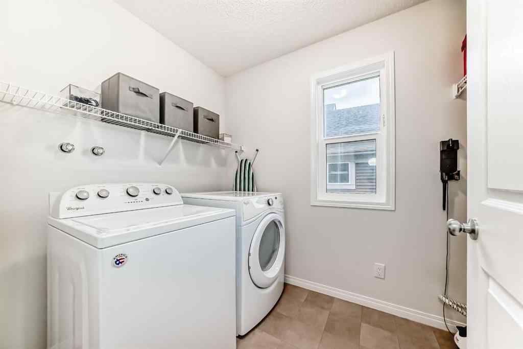 MLS® A2256583 - 58 Buckskin Way  in Heartland Cochrane, Residential