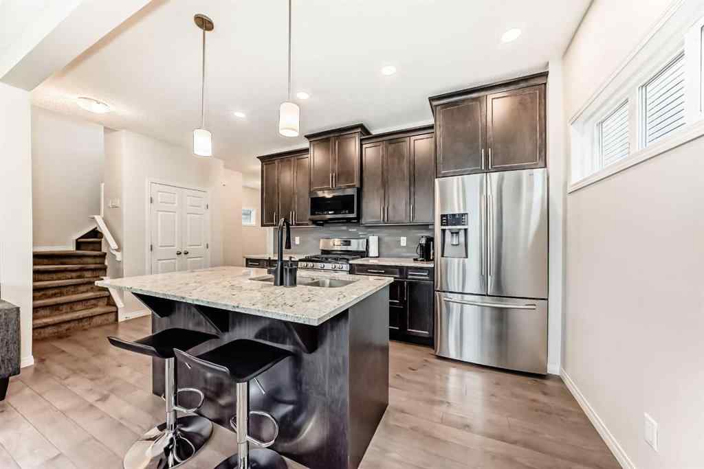 MLS® A2256583 - 58 Buckskin Way  in Heartland Cochrane, Residential