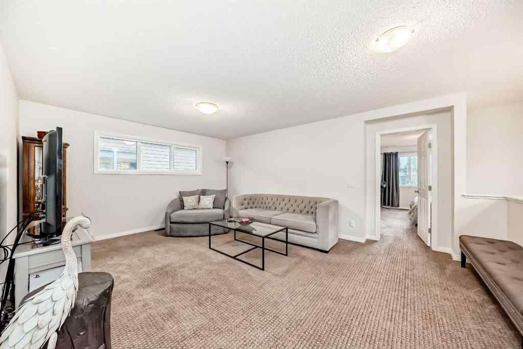 MLS® A2256583 - 58 Buckskin Way  in Heartland Cochrane, Residential