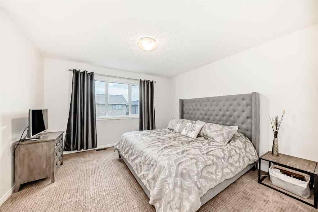 MLS® A2256583 - 58 Buckskin Way  in Heartland Cochrane, Residential