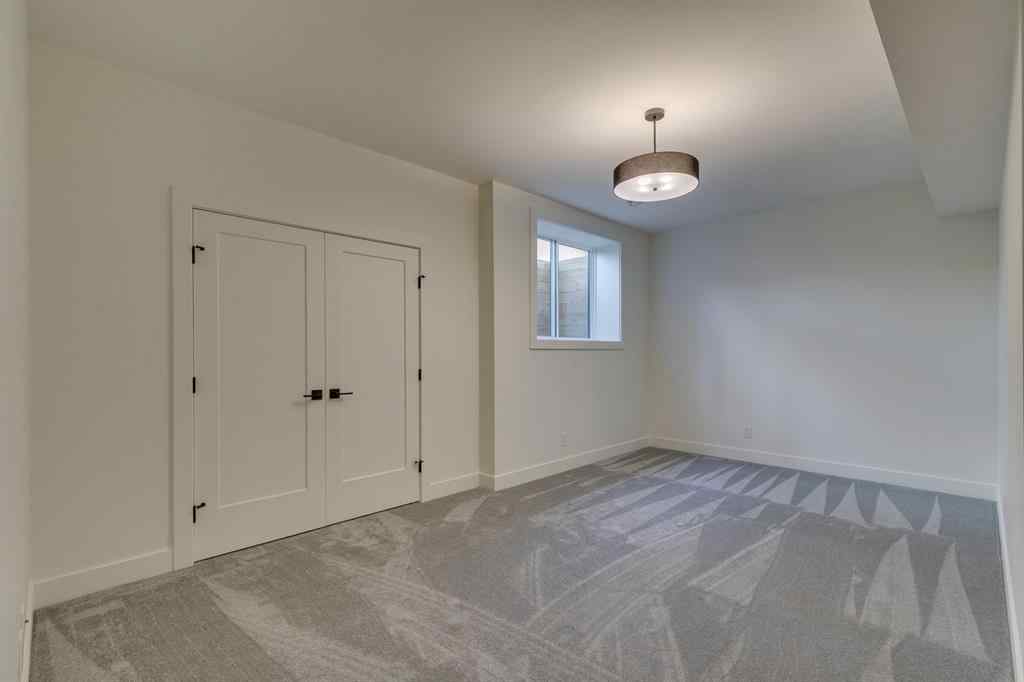 MLS® A2256608 - 48 Elveden Park SW in Springbank Hill Calgary, Residential
