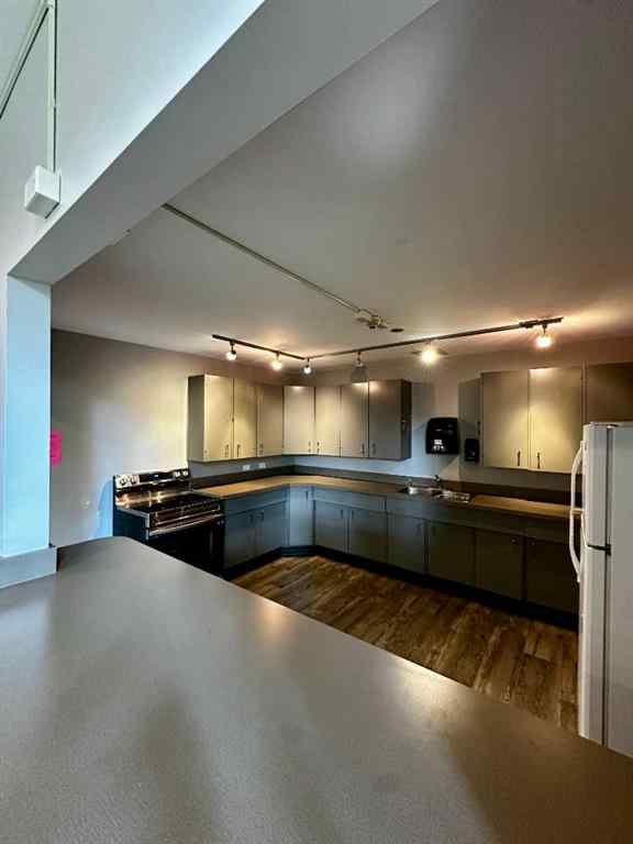 MLS® A2256624 - Unit #109 1616 8 Avenue NW in Hounsfield Heights/Briar Hill Calgary, Residential