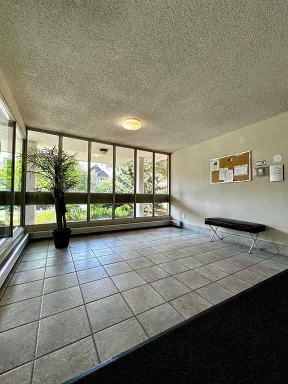 MLS® A2256624 - Unit #109 1616 8 Avenue NW in Hounsfield Heights/Briar Hill Calgary, Residential