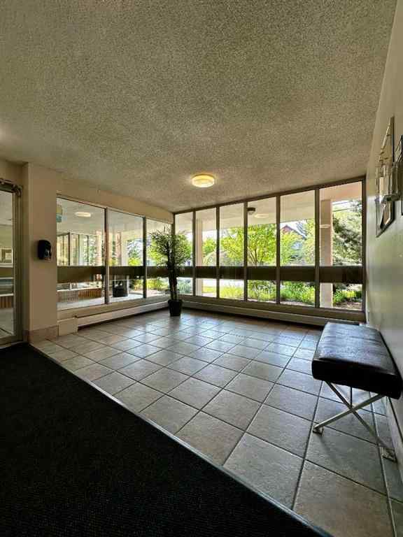 MLS® A2256624 - Unit #109 1616 8 Avenue NW in Hounsfield Heights/Briar Hill Calgary, Residential