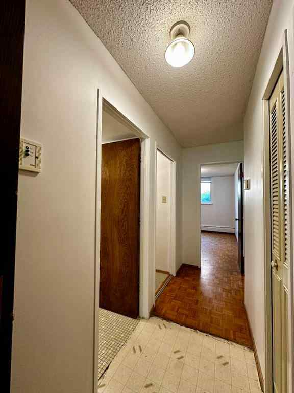 MLS® A2256624 - Unit #109 1616 8 Avenue NW in Hounsfield Heights/Briar Hill Calgary, Residential