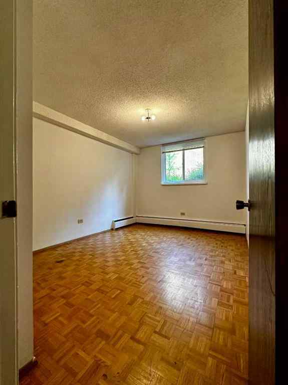 MLS® A2256624 - Unit #109 1616 8 Avenue NW in Hounsfield Heights/Briar Hill Calgary, Residential