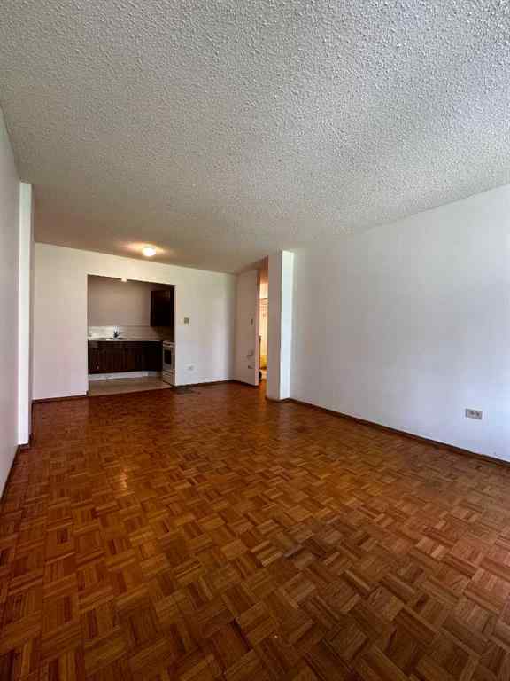 MLS® A2256624 - Unit #109 1616 8 Avenue NW in Hounsfield Heights/Briar Hill Calgary, Residential