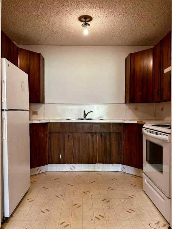 MLS® A2256624 - Unit #109 1616 8 Avenue NW in Hounsfield Heights/Briar Hill Calgary, Residential