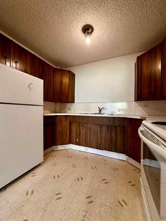 MLS® A2256624 - Unit #109 1616 8 Avenue NW in Hounsfield Heights/Briar Hill Calgary, Residential