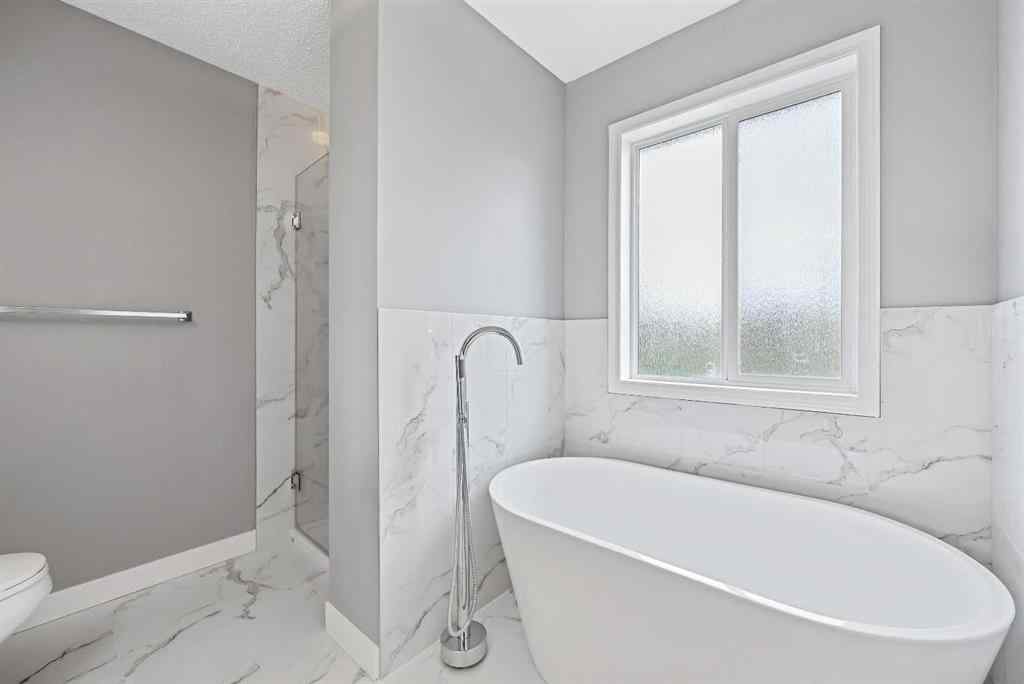 MLS® A2256635 - 8018 Cougar Ridge Avenue SW in Cougar Ridge Calgary, Residential