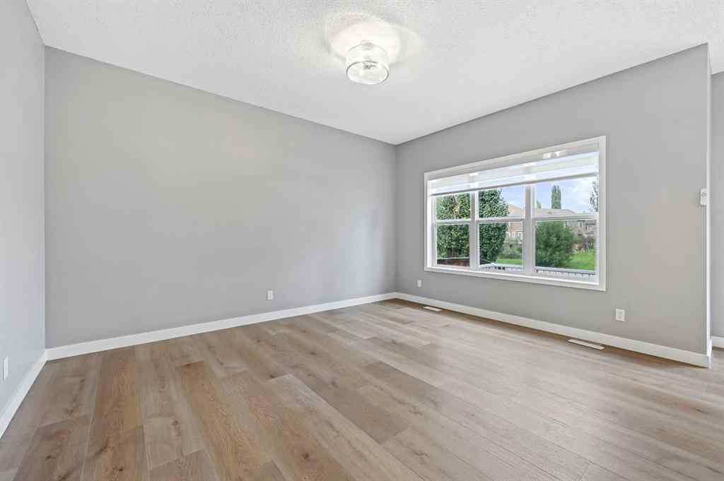 MLS® A2256635 - 8018 Cougar Ridge Avenue SW in Cougar Ridge Calgary, Residential