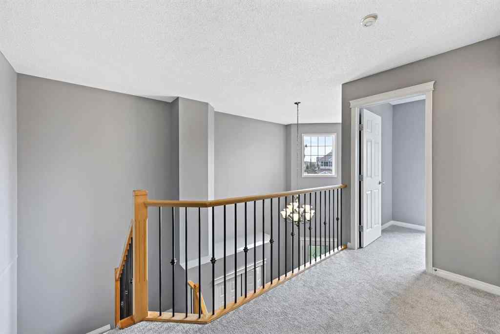 MLS® A2256635 - 8018 Cougar Ridge Avenue SW in Cougar Ridge Calgary, Residential