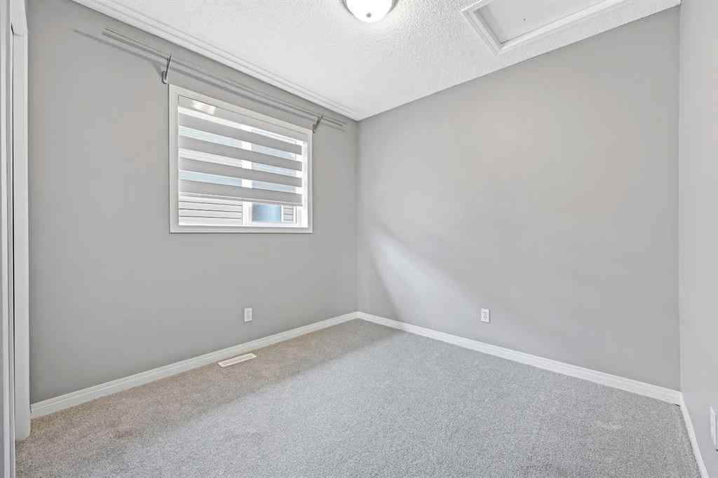 MLS® A2256635 - 8018 Cougar Ridge Avenue SW in Cougar Ridge Calgary, Residential