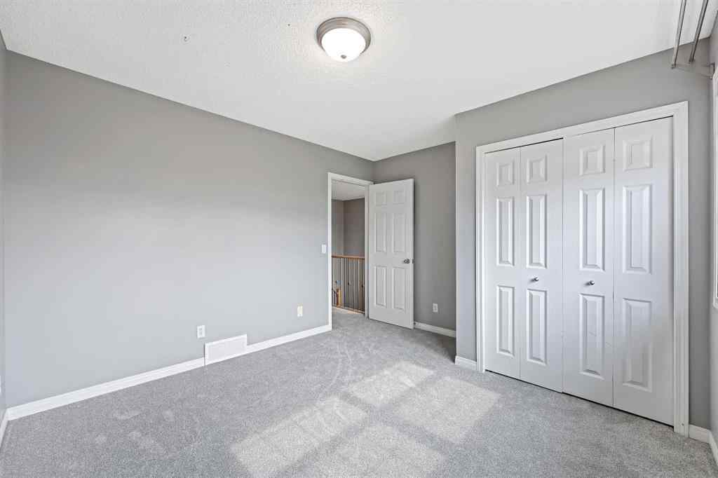 MLS® A2256635 - 8018 Cougar Ridge Avenue SW in Cougar Ridge Calgary, Residential