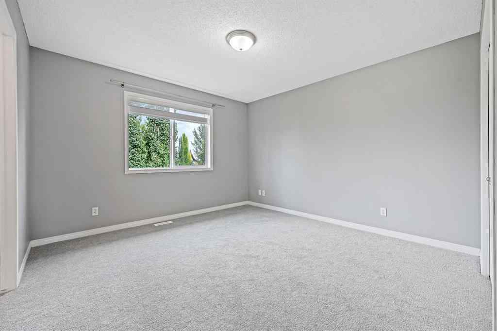 MLS® A2256635 - 8018 Cougar Ridge Avenue SW in Cougar Ridge Calgary, Residential